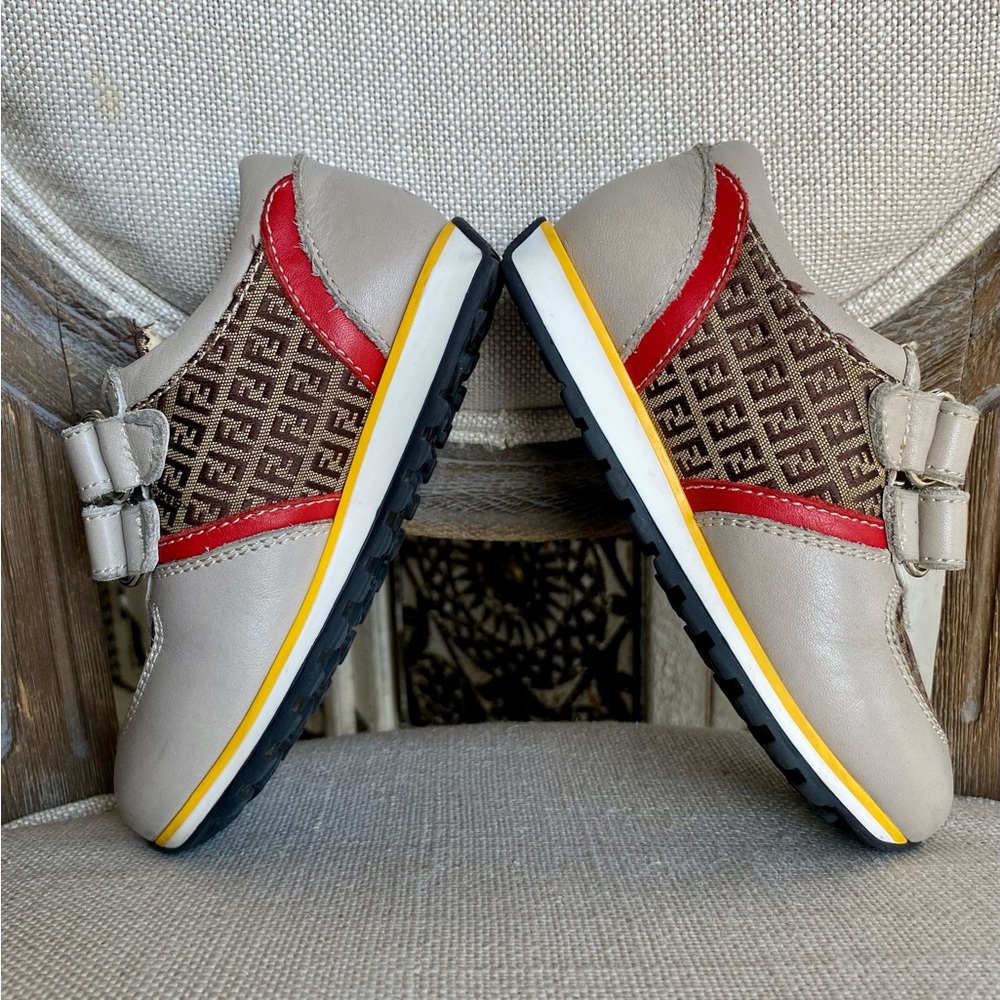 Fendi leather logo toddler sneakers sz 25 (US 8.5) w/ red/yellow leather detail.